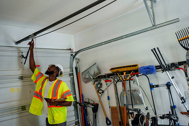 Professional Garage Door Roller Replacement technician working in Sterling Heights, MI